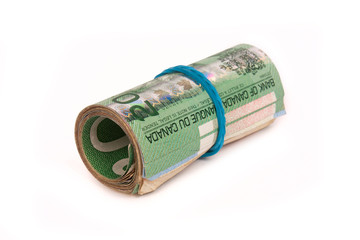One roll of canadian dollars with white background