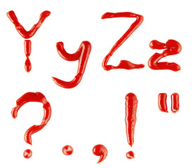 letters and signs made of ketchup on white background