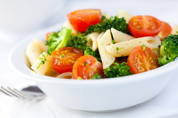 Pasta salad with cherry tomatoes and broccoli