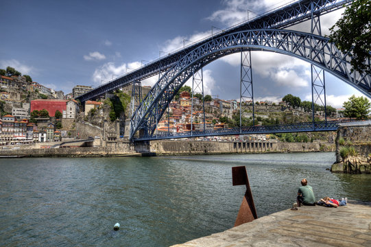 Tourists by The Dom Luís I Bridge, Porto, Portugal