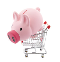 Piggy bank with shopping cart. Clipping path included
