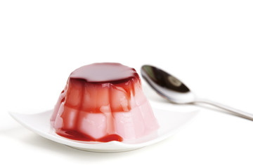 Raspberry pudding with spoon