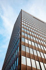 Fototapeta na wymiar modern office building against the blue sky
