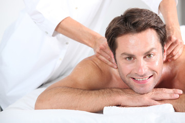 Fototapeta na wymiar Man having massage