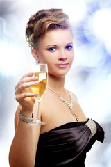 Young woman with a glass of champagne