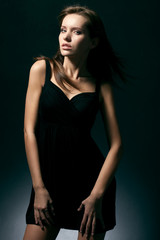 Fototapeta premium woman wearing black dress