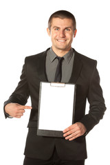 Young businessman holding blank board, isolated on white