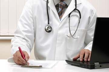 Writing a prescription or medical examination notes