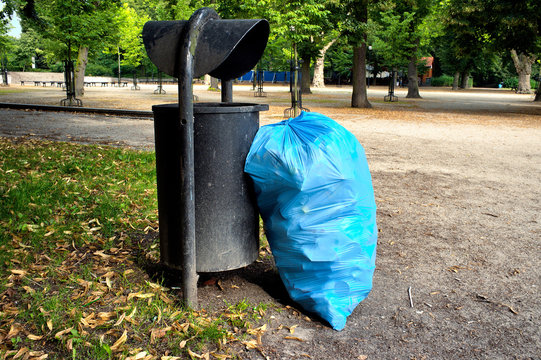 Bag of rubish and litter bin