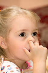 Girl with finger in his nose