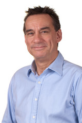 Portrait of Attractive Smiling Middle Age Man in Blue Shirt