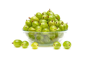 gooseberries in a glass bowl on a white background