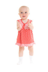 Baby in dress on a white background.