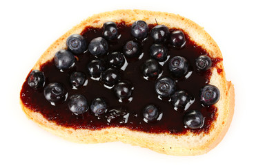 yummy toast with jam and blueberries isolated on white