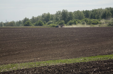 The plowed field.