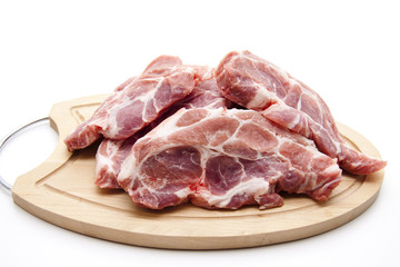 Kotelett auf Holzteller