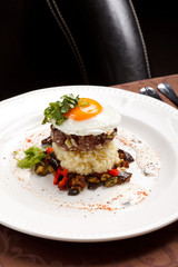 beef burger with egg and potatoes