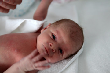 Newborn baby boy only a few hours old