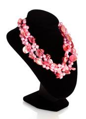 the pearls on a mannequin isolated on white