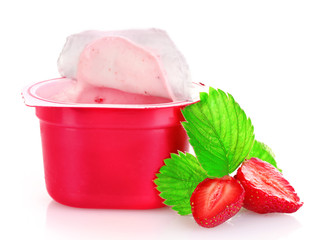 yogurt and strawberries isolated on white