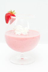 a strawberry milk shake against white background