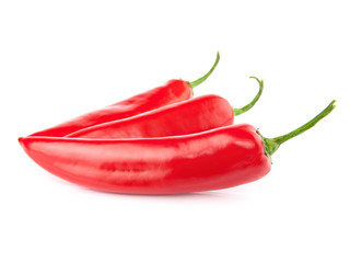 three red hot chili pepper isolated on a white background