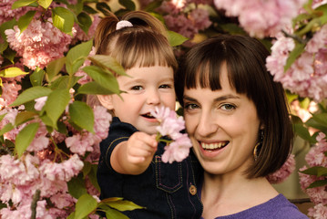 Mother and daughter in garden