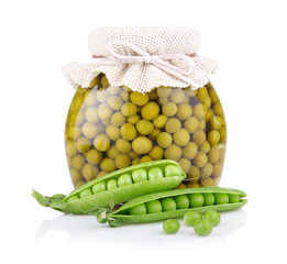 Jar of green pea with fresh pods isolated on white