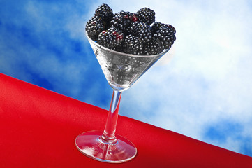 Blackberry cup with leaves