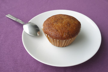 Banana cake on white disk