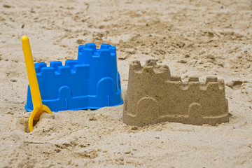Sandcastle with shovel