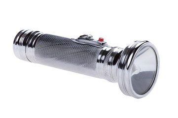 metal flashlight on white background