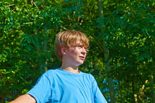 Cute Boy Sweating After Outdoor Sports In Nature