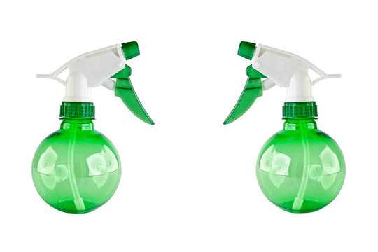 two green plastic water spray bottle isolated