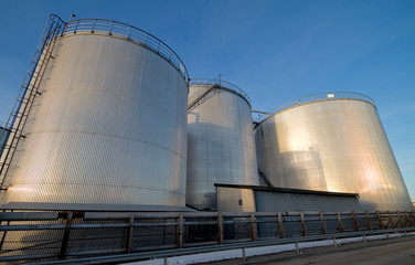 Three big storage tanks for fuel.