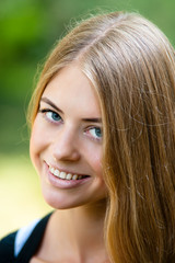 Beautiful young woman smiling