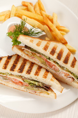 Sandwiches with French fried potatoes