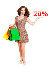 junge Frau zeigt 20% Angebot