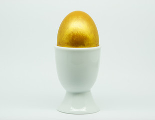 Golden Egg in an egg cup