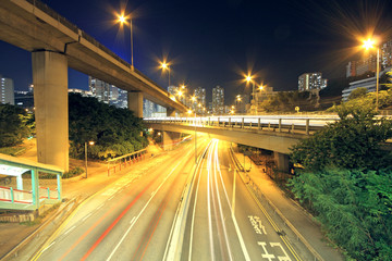 Fototapeta na wymiar Traffic through the city (traffic seen as trails of light)