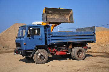 excavator loading truck