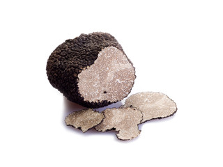 slice black truffle on white background - obrazy, fototapety, plakaty