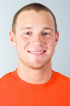 Handsome Man In An Orange Shirt