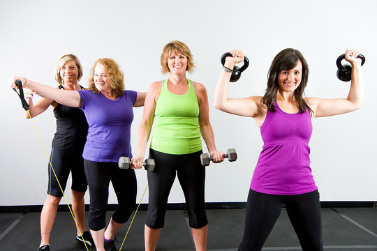 Group of women working out at a gym