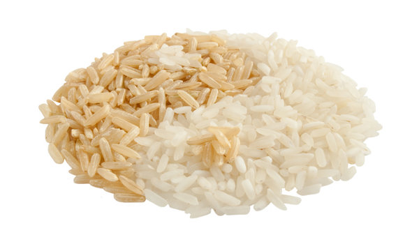 yin yang sign made of brown and white rice
