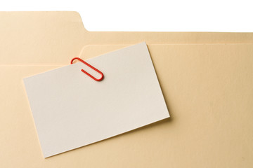 Blank message card clipped on file folder
