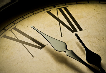 Closeup of antique clock and time is midnight