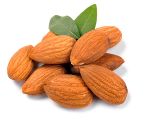 Group of almond nuts with leaves