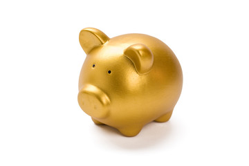 Golden piggy bank on white backgound