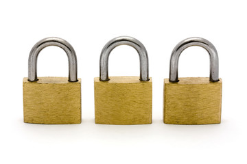 Naklejka premium Three padlocks in a row